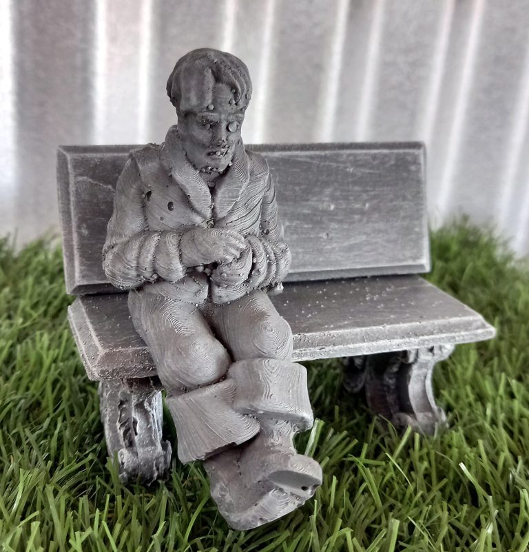 MS 095 – Man sitting on bench with folded hands
